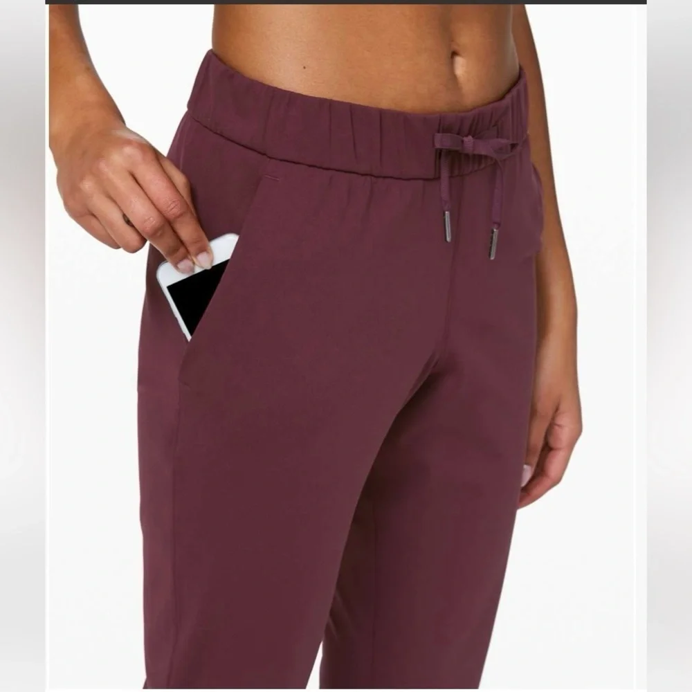 Lululemon On the Fly 7/8 Pants Dark Adobe Maroon Size 4 EUC